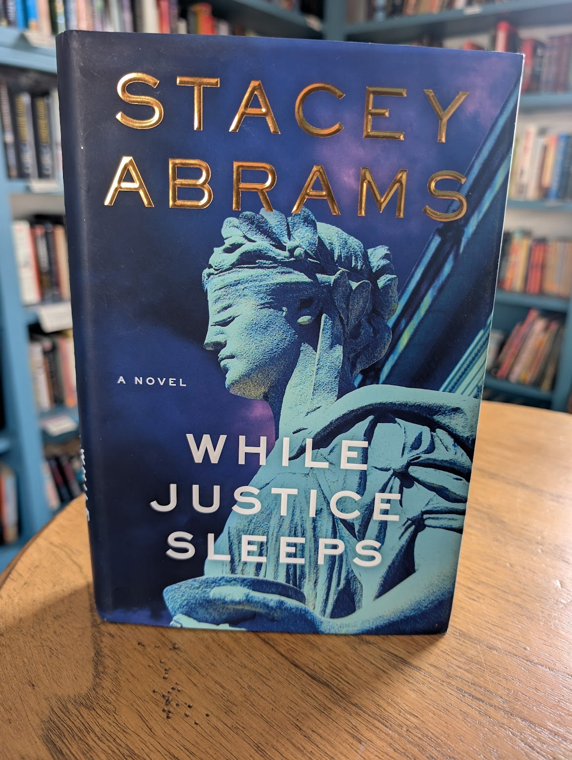 (Pre-Loved) While Justice Sleeps by Stacey Abrams